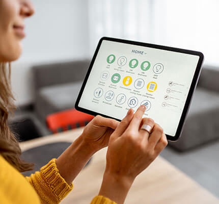 Close up of a woman using a tablet